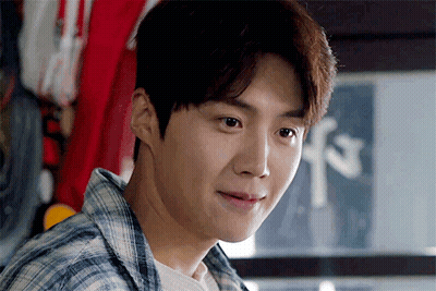 A Close Up Of A Man 'S Face With A Sign In The Background That Says F3 GIF