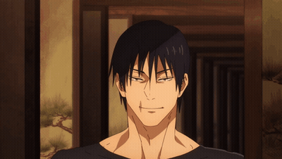 A Close Up Of A Man 'S Face With A Slight Smile On His Face GIF
