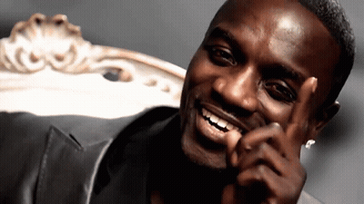 A Close Up Of A Man 'S Face With A Smile GIF