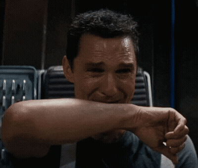A Close Up Of A Man 'S Face With A Smile On His Face GIF