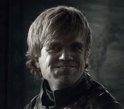 A Close Up Of A Man 'S Face With A Smile On It . GIF