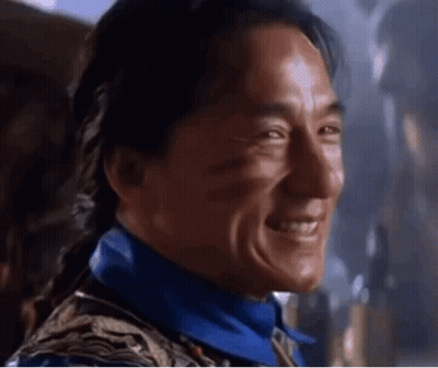 A Close Up Of A Man 'S Face With A Smile On It . GIF