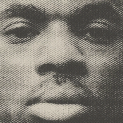 A Close Up Of A Man 'S Face With A Spider On It GIF