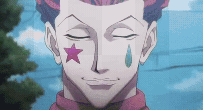 A Close Up Of A Man 'S Face With A Star And A Tear On His Cheek . GIF