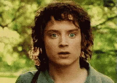 A Close Up Of A Man 'S Face With A Surprised Expression . GIF