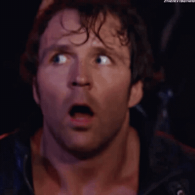A Close Up Of A Man 'S Face With A Surprised Look On His Face And His Mouth Open . GIF