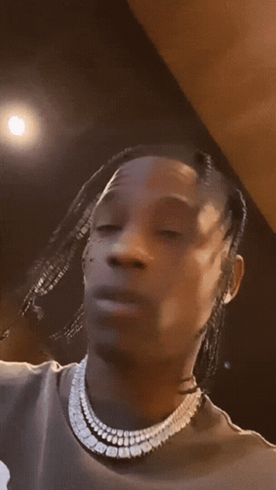 A Close Up Of A Man 'S Face With A Tattoo On His Face That Says Tnpk GIF