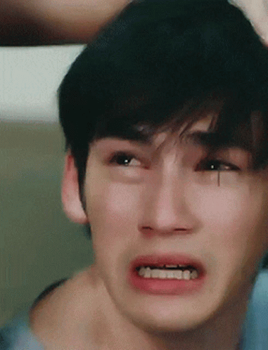 A Close Up Of A Man 'S Face With A Tear Running Down His Eye GIF