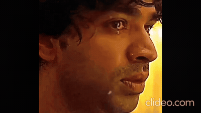 A Close Up Of A Man 'S Face With A Tear Running Down His Eye . GIF