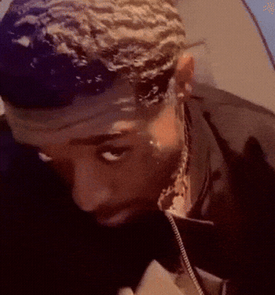 A Close Up Of A Man 'S Face With A Tear Running Down His Face GIF