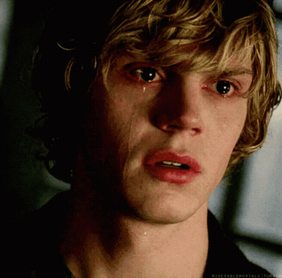 A Close Up Of A Man 'S Face With A Tear Running Down His Face GIF