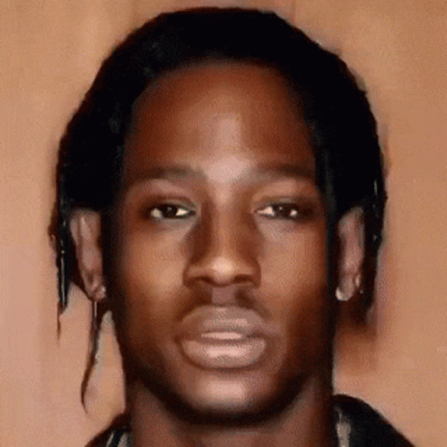 A Close Up Of A Man 'S Face With A Very Serious Look On His Face GIF