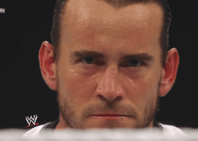 A Close Up Of A Man 'S Face With A W Logo On The Bottom GIF