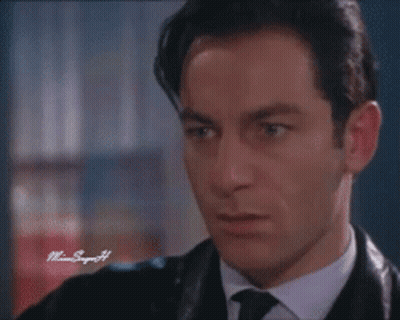 A Close Up Of A Man 'S Face With A Watermark That Says Miami Singer 44 GIF
