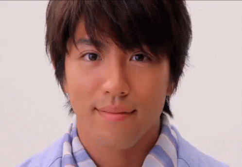 A Close Up Of A Man 'S Face With A White Background GIF