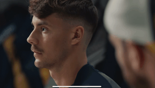 A Close Up Of A Man 'S Face With A White Border GIF