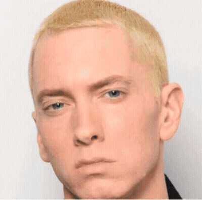A Close Up Of A Man 'S Face With A White Headband On GIF