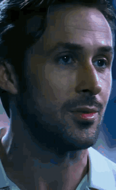 A Close Up Of A Man 'S Face With A White Shirt On GIF
