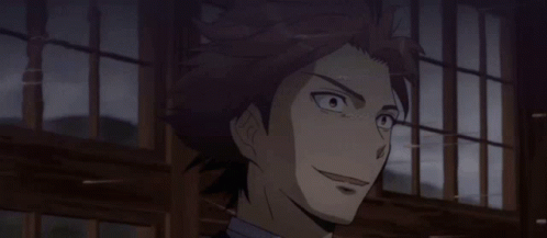 A Close Up Of A Man 'S Face With A Window Behind Him GIF