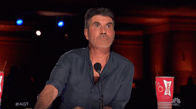 A Close Up Of A Man 'S Face With #Agt Written On The Bottom Right GIF