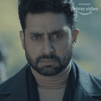 A Close Up Of A Man 'S Face With An Amazon Prime Video Arrow GIF