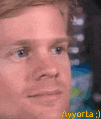 A Close Up Of A Man 'S Face With Ayyorta Written Below GIF