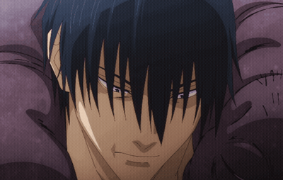A Close Up Of A Man 'S Face With Black Hair GIF