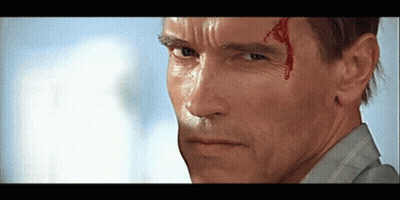 A Close Up Of A Man 'S Face With Blood Coming Out Of His Forehead GIF