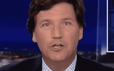 A Close Up Of A Man 'S Face With Blue Eyes GIF
