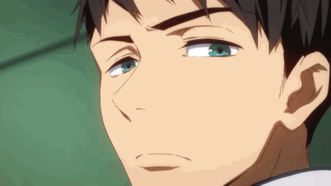 A Close Up Of A Man 'S Face With Blue Eyes Making A Funny Face GIF
