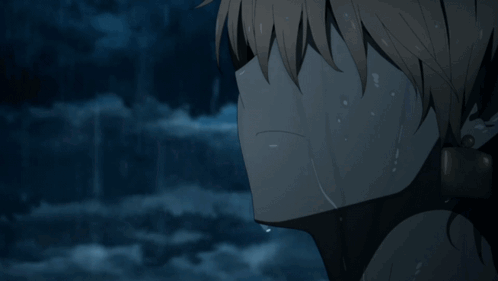 A Close Up Of A Man 'S Face With Chinese Writing On It GIF