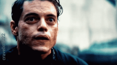 A Close Up Of A Man 'S Face With Crawling 032 Written In The Corner GIF