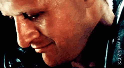 A Close Up Of A Man 'S Face With Crawling2002 Written Below It GIF
