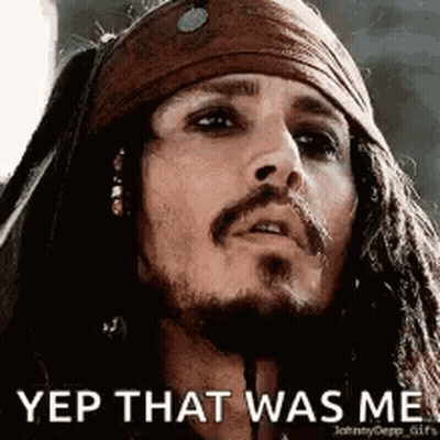 A Close Up Of A Man 'S Face With Dreadlocks And A Bandana On His Head . GIF