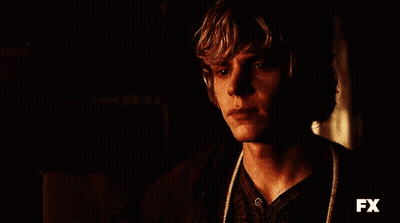 A Close Up Of A Man 'S Face With Fx Written On The Bottom GIF