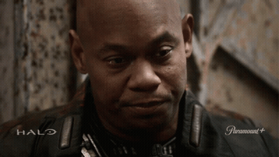 A Close Up Of A Man 'S Face With Halo On The Bottom GIF
