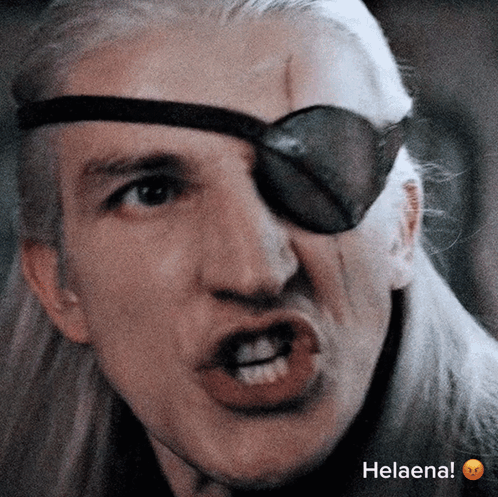 A Close Up Of A Man 'S Face With Helaena Written On The Bottom Right GIF