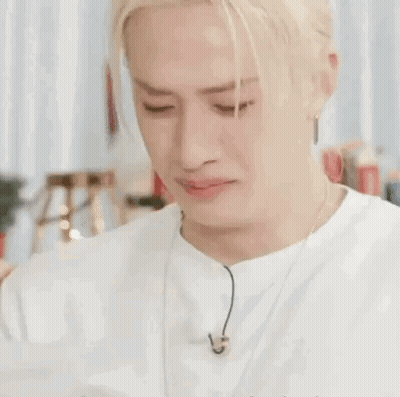A Close Up Of A Man 'S Face With His Eyes Closed . GIF