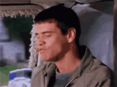 A Close Up Of A Man 'S Face With His Eyes Closed . GIF