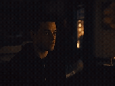 A Close Up Of A Man 'S Face With His Eyes Closed GIF