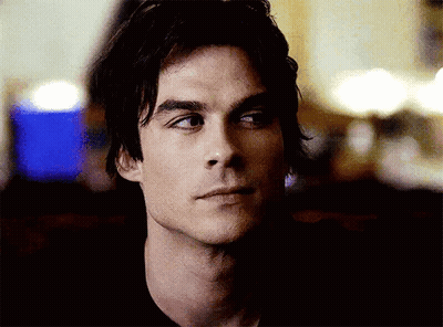 A Close Up Of A Man 'S Face With His Eyes Closed And A Serious Look On His Face . GIF