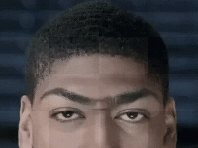 A Close Up Of A Man 'S Face With His Eyes Closed And His Hair Visible . GIF