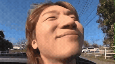 A Close Up Of A Man 'S Face With His Eyes Closed And His Mouth Open GIF