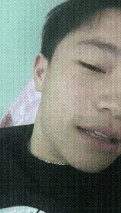 A Close Up Of A Man 'S Face With His Eyes Closed And His Mouth Open GIF