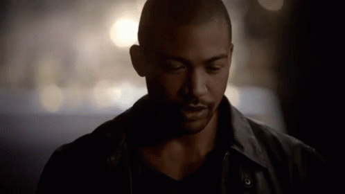 A Close Up Of A Man 'S Face With His Eyes Closed . GIF