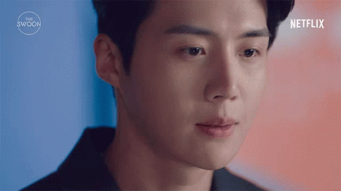 A Close Up Of A Man 'S Face With His Eyes Closed . GIF