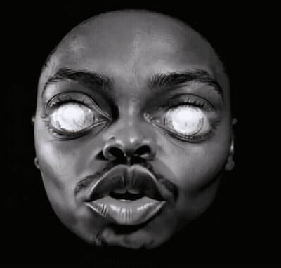 A Close Up Of A Man 'S Face With His Eyes Glowing GIF
