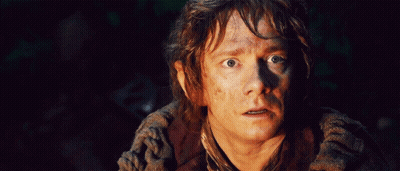 A Close Up Of A Man 'S Face With His Eyes Wide Open GIF