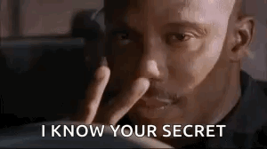 A Close Up Of A Man 'S Face With His Finger In His Nose . GIF