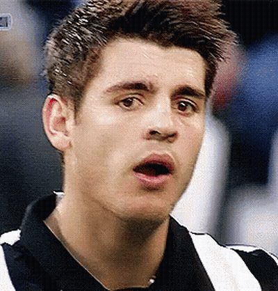 A Close Up Of A Man 'S Face With His Mouth Open And His Eyes Closed GIF